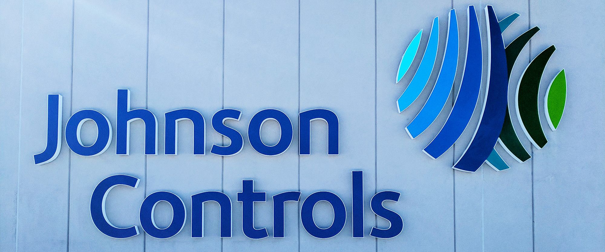 Company sign rollouts - balancing pragmatism with realism.